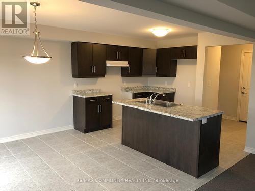 91 Monarch St, Welland, ON - Indoor Photo Showing Kitchen With Double Sink