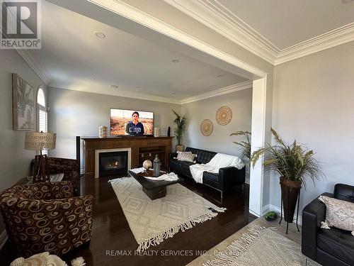 15 Riverglen St, Brampton, ON - Indoor Photo Showing Bedroom With Fireplace