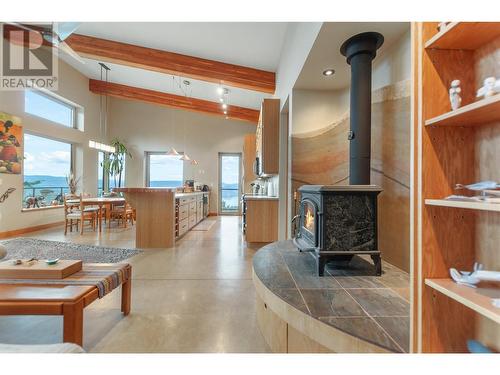 102 Vista Place, Penticton, BC - Indoor Photo Showing Living Room With Fireplace