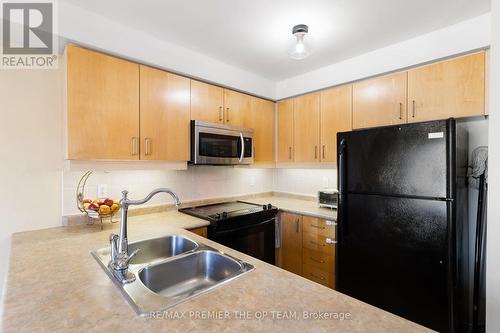 387 Van Kirk Drive, Brampton, ON - Indoor Photo Showing Kitchen With Double Sink