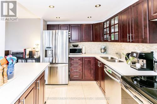 602 - 3590 Kaneff Crescent, Mississauga, ON - Indoor Photo Showing Kitchen With Double Sink