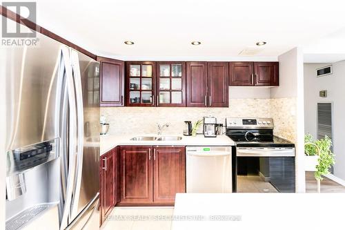 602 - 3590 Kaneff Crescent, Mississauga, ON - Indoor Photo Showing Kitchen With Double Sink