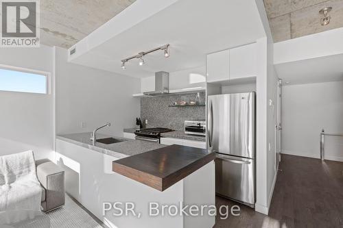 #909 -75 Portland St, Toronto, ON - Indoor Photo Showing Kitchen With Stainless Steel Kitchen With Double Sink