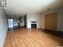 404 Cedar Meadow Drive, Regina, SK  - Indoor Photo Showing Living Room With Fireplace 