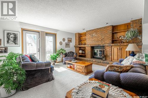 219 Benesh Crescent, Saskatoon, SK - Indoor Photo Showing Living Room With Fireplace
