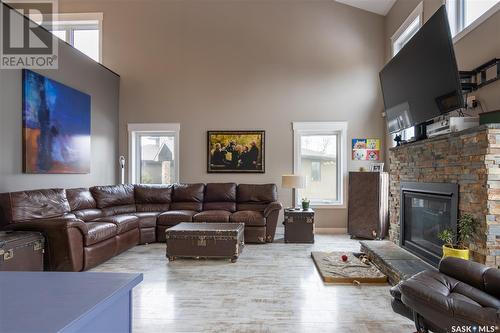 1210 Dennis Street, Esterhazy, SK - Indoor Photo Showing Living Room With Fireplace