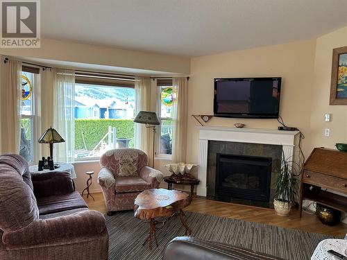 859 8 Avenue, Vernon, BC - Indoor Photo Showing Living Room With Fireplace