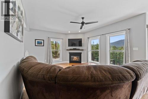 2457 Salmon River Road, Salmon Arm, BC - Indoor Photo Showing Bedroom With Fireplace