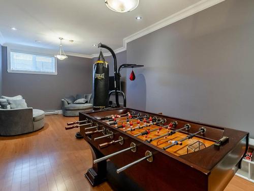 Playroom - 7845 Rue De Liverpool, Brossard, QC - Indoor Photo Showing Gym Room