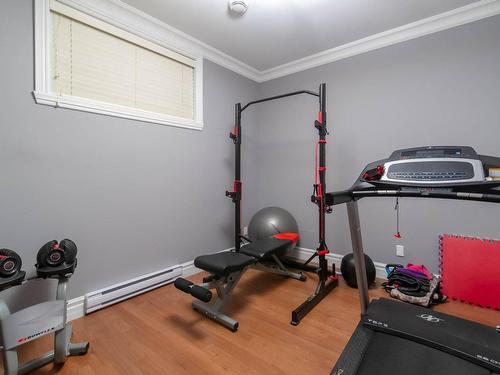 Bedroom - 7845 Rue De Liverpool, Brossard, QC - Indoor Photo Showing Gym Room