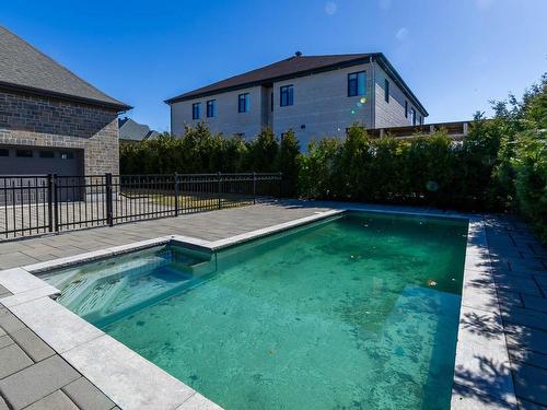 Cour - 7845 Rue De Liverpool, Brossard, QC - Outdoor With In Ground Pool With Backyard