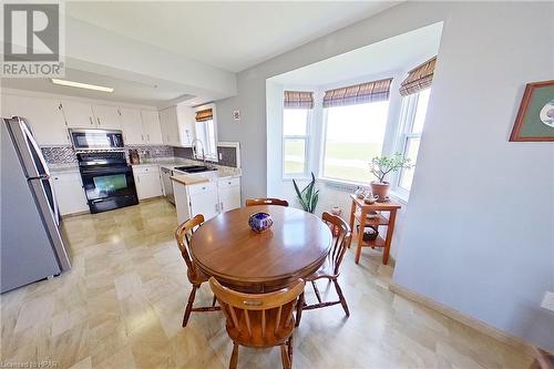 Dining room with bay window facing the lake. - 34481 Hendrick Road, Bluewater (Munic), ON - Indoor