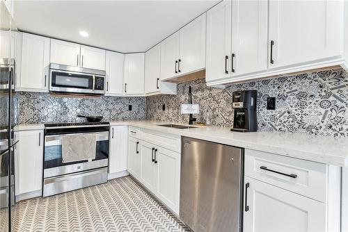 12 Fredrick Avenue, Tiny, ON - Indoor Photo Showing Kitchen With Double Sink With Upgraded Kitchen