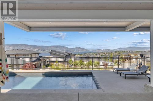 5670 Mountainside Court, Kelowna, BC - Outdoor With In Ground Pool With Exterior