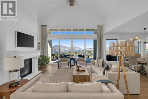 5670 Mountainside Court, Kelowna, BC - Indoor Photo Showing Living Room With Fireplace