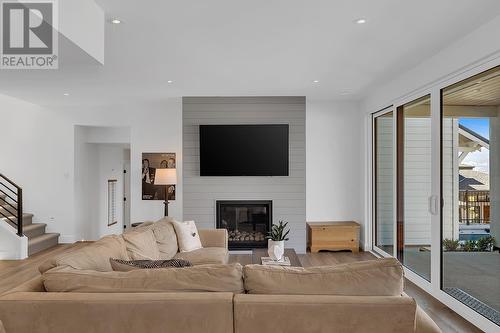 5670 Mountainside Court, Kelowna, BC - Indoor Photo Showing Living Room With Fireplace