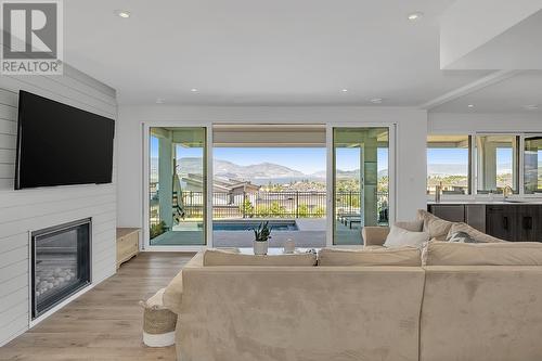 5670 Mountainside Court, Kelowna, BC - Indoor Photo Showing Living Room With Fireplace