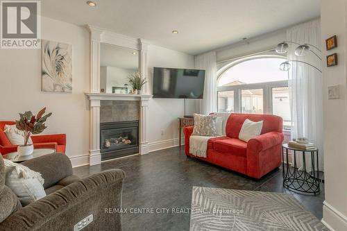 #1 -5 John Pound Rd, Tillsonburg, ON - Indoor Photo Showing Living Room With Fireplace