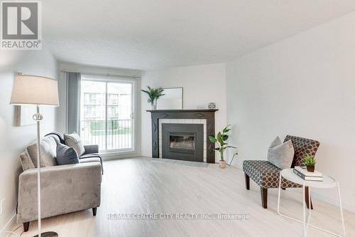 #203 -737 Deveron Cres, London, ON - Indoor Photo Showing Living Room With Fireplace