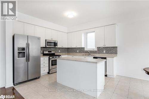 64 Christy Drive, Wasaga Beach, ON - Indoor Photo Showing Kitchen With Double Sink