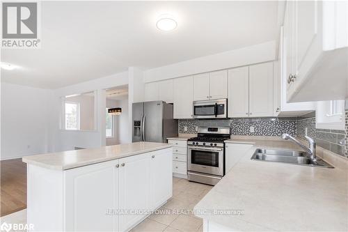 64 Christy Drive, Wasaga Beach, ON - Indoor Photo Showing Kitchen With Double Sink