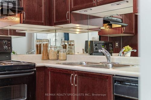 #106 -5150 Winston Churchill Blvd, Mississauga, ON - Indoor Photo Showing Kitchen With Double Sink