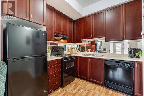 #106 -5150 Winston Churchill Blvd, Mississauga, ON - Indoor Photo Showing Kitchen With Double Sink