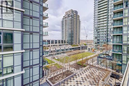 709 - 4070 Confederation Parkway, Mississauga, ON - Outdoor With Balcony With Facade