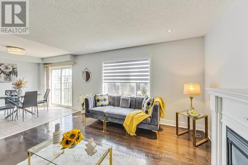 28 Marriner Crescent, Ajax, ON - Indoor Photo Showing Living Room With Fireplace