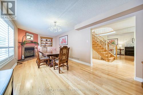 5146 Nishga Crt, Mississauga, ON - Indoor Photo Showing Dining Room With Fireplace