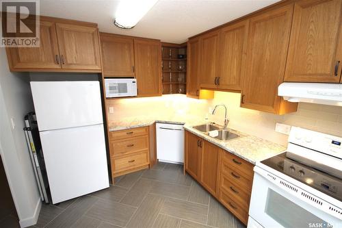 304 2275 Mcintyre Street, Regina, SK - Indoor Photo Showing Kitchen With Double Sink