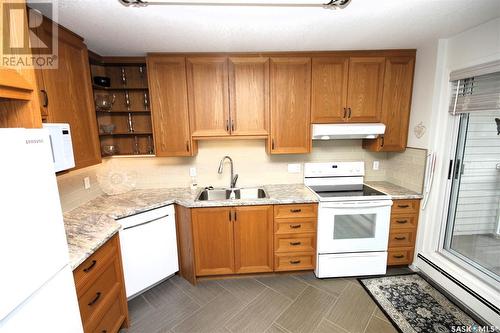 304 2275 Mcintyre Street, Regina, SK - Indoor Photo Showing Kitchen With Double Sink