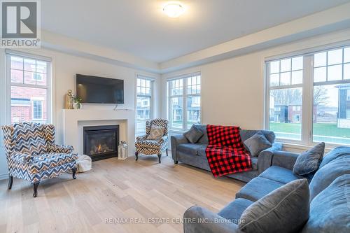 3 Milt Schmidt Street, Kitchener, ON - Indoor Photo Showing Living Room With Fireplace