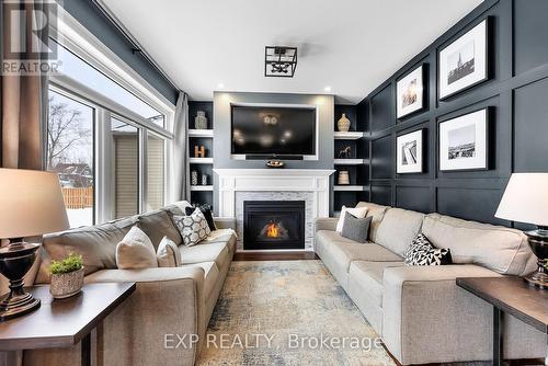 4026 Village Creek Dr, Fort Erie, ON - Indoor Photo Showing Living Room With Fireplace