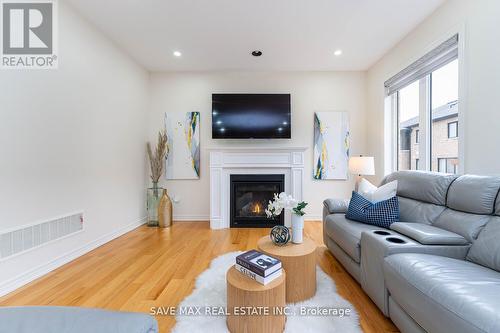 25 Fann Drive, Brampton, ON - Indoor Photo Showing Living Room With Fireplace