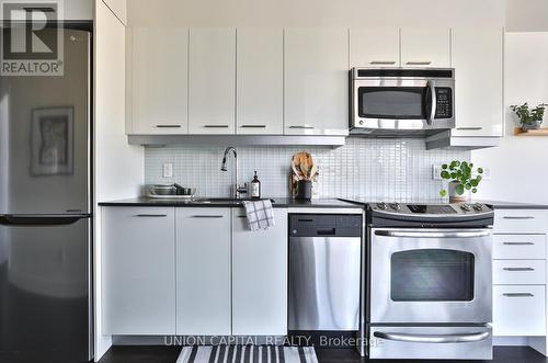 #211 -90 Trinity St, Toronto, ON - Indoor Photo Showing Kitchen With Stainless Steel Kitchen With Upgraded Kitchen