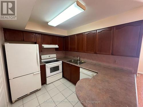 402 - 1765 Queen Street E, Toronto, ON - Indoor Photo Showing Kitchen With Double Sink