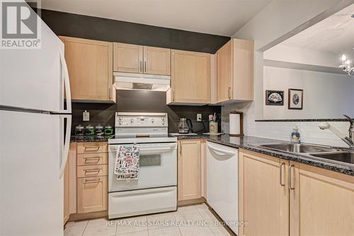 #405 -1 Balmoral Ave, Toronto, ON - Indoor Photo Showing Kitchen With Double Sink