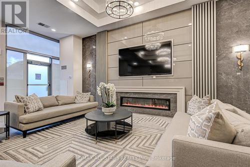 #405 -1 Balmoral Ave, Toronto, ON - Indoor Photo Showing Living Room With Fireplace