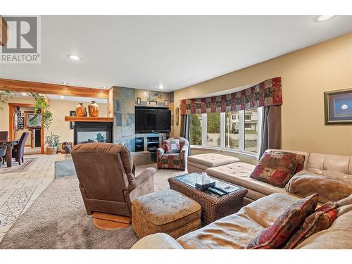 4575 Bolduc Road, Vernon, BC - Indoor Photo Showing Living Room With Fireplace