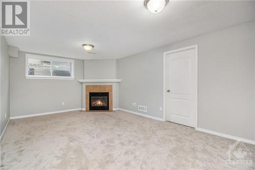 220 Berrigan Drive, Ottawa, ON - Indoor With Fireplace