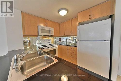 #902 -350 Princess Royal Dr, Mississauga, ON - Indoor Photo Showing Kitchen With Double Sink