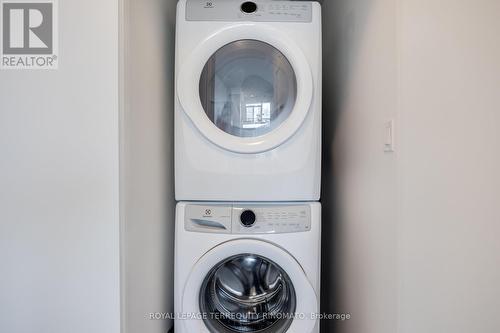 1409 - 50 Ordnance Street, Toronto, ON - Indoor Photo Showing Laundry Room