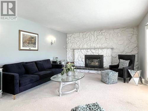 7 Magnolia Place, Osoyoos, BC - Indoor Photo Showing Living Room With Fireplace