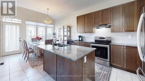 41 Atkinson Crescent, New Tecumseth, ON - Indoor Photo Showing Kitchen With Stainless Steel Kitchen With Double Sink