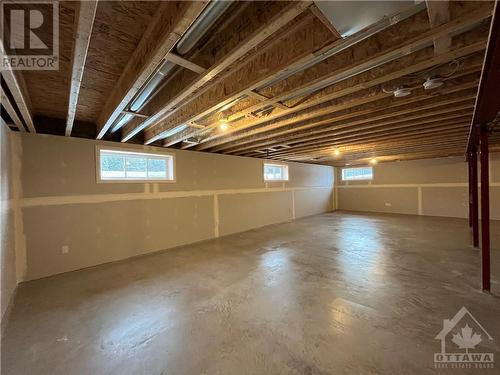 Lower Level Drywalled and ready for your finishing touches - 819 Solidex Place, Russell, ON - Indoor Photo Showing Basement