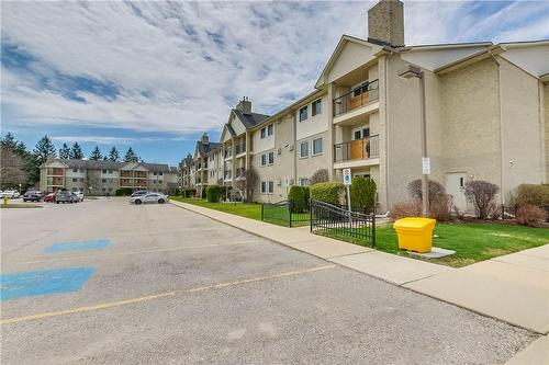 725 Deveron Crescent|Unit #108, London, ON - Outdoor With In Ground Pool