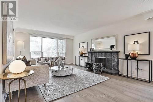 81 Maxome Ave, Toronto, ON - Indoor Photo Showing Living Room With Fireplace