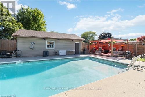 301 Newton Crt, Sarnia, ON - Outdoor With In Ground Pool With Backyard