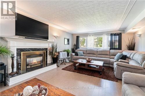 301 Newton Court, Sarnia, ON - Indoor Photo Showing Living Room With Fireplace
